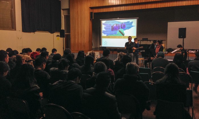Pastor Pete praying at the Information Evening